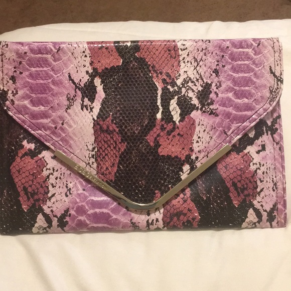 Handbags - BCBG snakeskin clutch